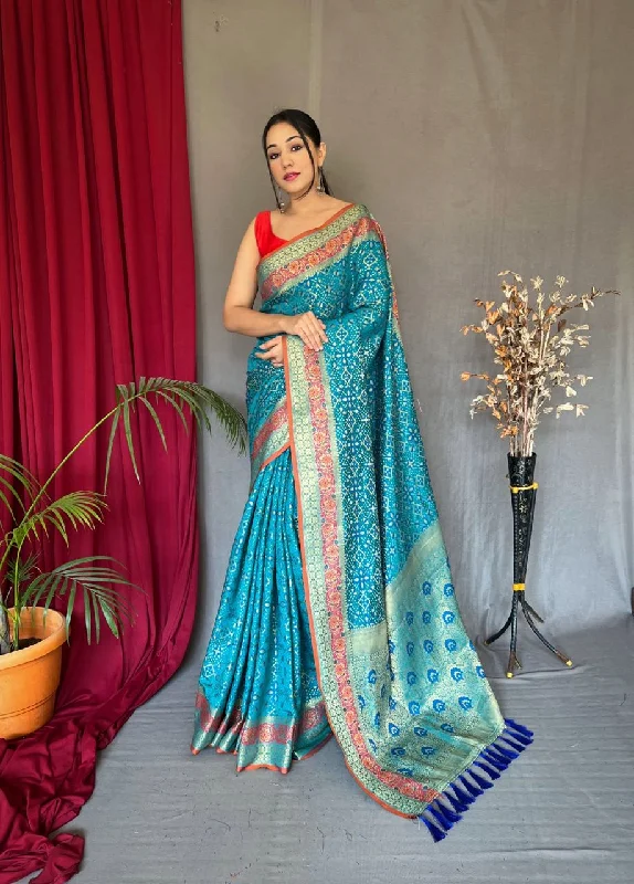 Women Party Wear Patola Silk Saree with Un Stitched Blouse Textured Cotton Blouse