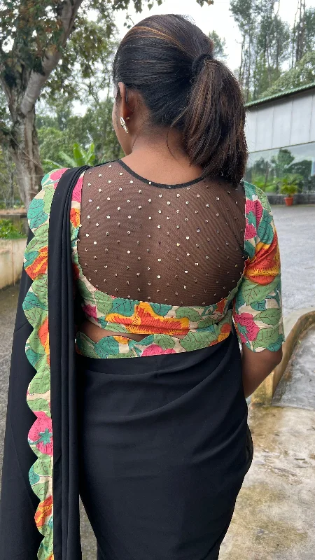 Black georgette saree with floral cotton blouse Embroidered Floral Blouse
