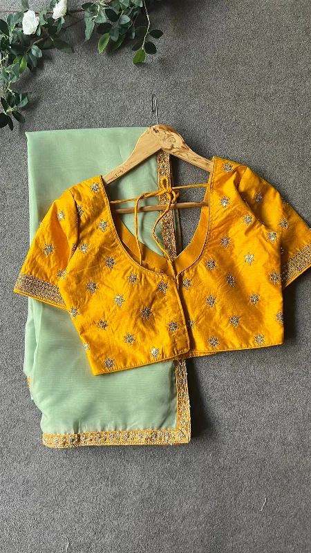 Mint organza saree with yellow embroidery blouse Elegant Silk Blouse
