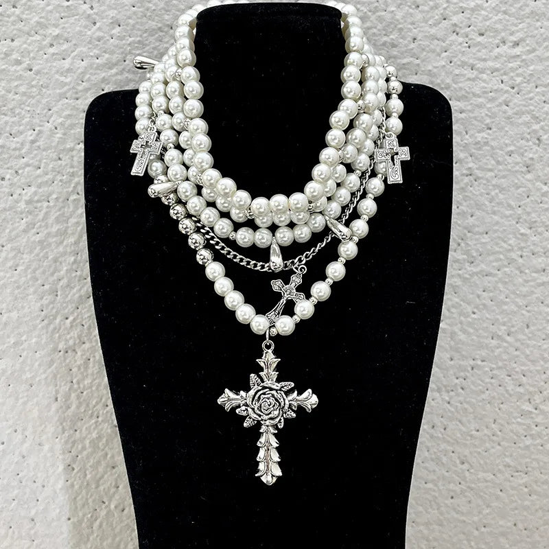 Pearl beaded necklaces are layered with men's and women's sweaters Cable Knit Ribbed Knit Lace Knit